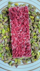 Ruby Cacao & Raspberry Dubai recipe Chocolate Pistachios filling Handcrafted bar