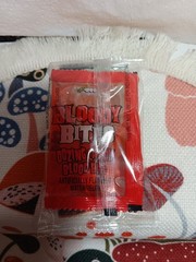 2 BAGS- BLOODY BITES GLOW IN THE DARK PLASTIC VAMPIRE FANGS OOZING BLOOD CANDY!!