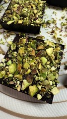8 Dark Chocolate square Dubai filling & Pistachios on top handmade 520g.