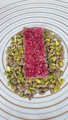 Ruby Cacao & Raspberry Dubai recipe Chocolate Pistachios filling Handcrafted bar