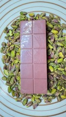 Ruby Cacao & Raspberry Dubai recipe Chocolate Pistachios filling Handcrafted bar