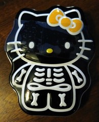 HELLO KITTY SKELLY BONES TIN BOX sealed skeleton 2012 RARE orange candy bones