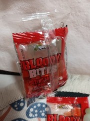 2 BAGS- BLOODY BITES GLOW IN THE DARK PLASTIC VAMPIRE FANGS OOZING BLOOD CANDY!!