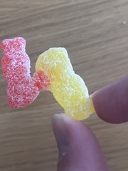 a sour patch kid thats connected by the head